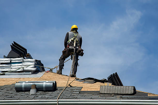 Professional Gutter Installation technician working in Dracut, MA